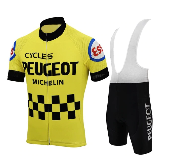 The Peugeot Esso Retro Cycling Jersey Set features a yellow jersey with Cycles Peugeot and Michelin logos, black checkered pattern, and sleeve patches. The black bib shorts highlight the Peugeot logo. Made from lightweight, breathable fabric for true performance in cycling.